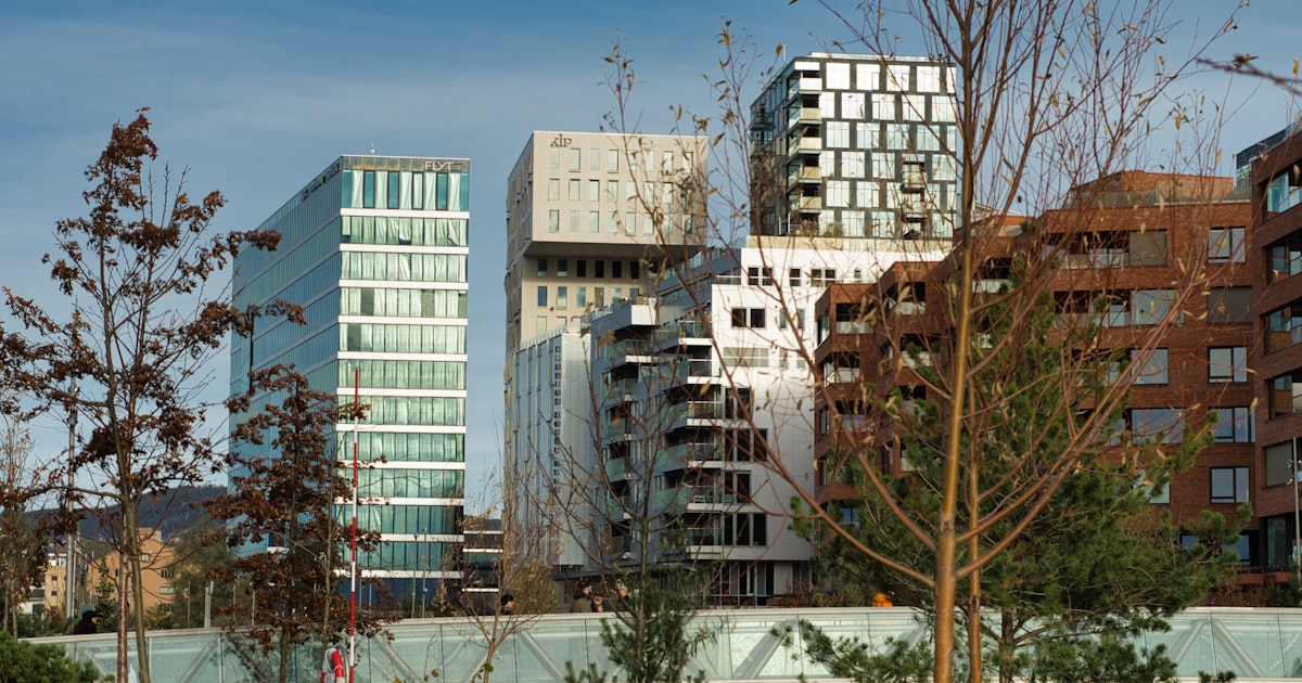 Modern energy-efficient buildings with green surroundings